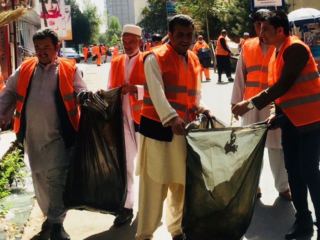 Photo of people participating in the cleanup event in Afghanistan